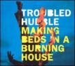 Making Beds In A Burning House