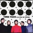 Timid Tiger & A Pile Of Pipers